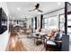 Stylish living room featuring a modern ceiling fan and large windows overlooking the yard at 2047 Seavey Dr, Decatur, GA 30032