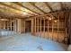 Unfinished basement with exposed beams, concrete floor, and visible wiring at 3740 Crowchild Dr, Cumming, GA 30041