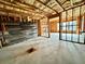 Unfinished basement with framed walls, and a concrete floor ready for your custom design and personalization at 3740 Crowchild Dr, Cumming, GA 30041