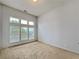 Bright, carpeted bedroom with large windows and a neutral color scheme at 3740 Crowchild Dr, Cumming, GA 30041