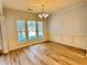 Charming dining room with hardwood floors and natural light at 3740 Crowchild Dr, Cumming, GA 30041