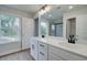 Bathroom featuring double vanity, black fixtures, and a glass-enclosed shower at 409 Carrera Ln, Acworth, GA 30102