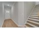 Welcoming entryway with stylish wood-look floors and a staircase to the upper level at 409 Carrera Ln, Acworth, GA 30102