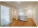 Upstairs hallway showcasing hardwood flooring and an open space to a laundry room at 409 Carrera Ln, Acworth, GA 30102