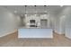 New construction kitchen with eat-in island and stainless steel microwave at 409 Carrera Ln, Acworth, GA 30102