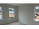 Bright bedroom with double hung windows and neutral walls at 420 Carrera Ln, Acworth, GA 30102