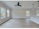 Open living room featuring laminate flooring and neutral paint at 420 Carrera Ln, Acworth, GA 30102