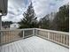 Exterior shot from the deck with white railings, showing the spacious outdoor area, inviting peaceful relaxation at 47 Brushy Mountain Way, Rockmart, GA 30153