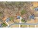An aerial shot highlights this property and surrounding neighborhood, showcasing its location at 6435 Ivey Creek Cir, Cumming, GA 30040