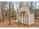 The backyard boasts a useful storage shed for gardening equipment or outdoor gear at 6435 Ivey Creek Cir, Cumming, GA 30040