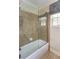 Shower-over-tub with glass screen at 950 Brook Knoll Ln, Cumming, GA 30041