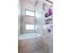 Bathroom featuring an updated tub/shower with dual windows at 1661 La France Ne St # 216, Atlanta, GA 30307