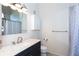 Bathroom features a vanity with marble countertop and updated fixtures at 1661 La France Ne St # 216, Atlanta, GA 30307
