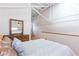 Bedroom featuring high ceilings, hanging chair and natural light at 1661 La France Ne St # 216, Atlanta, GA 30307