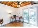 Home office with natural light, ceiling fan and sliding glass doors open to an outdoor patio at 1661 La France Ne St # 216, Atlanta, GA 30307