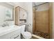 Bathroom with tiled walk-in shower, modern vanity, and updated fixtures at 2235 Emerald Springs Dr, Decatur, GA 30035