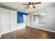 Stylish bedroom features new wood flooring and a built-in storage and bench seat at 2235 Emerald Springs Dr, Decatur, GA 30035