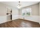 Cozy dining room with wainscoting, modern light fixture and plenty of natural light at 2235 Emerald Springs Dr, Decatur, GA 30035