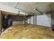 Spacious garage with two-car door and exposed ceiling at 2235 Emerald Springs Dr, Decatur, GA 30035