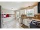Well-lit kitchen featuring granite countertops, tiled backsplash and stainless steel appliances at 2235 Emerald Springs Dr, Decatur, GA 30035