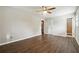 Large main bedroom suite with an ensuite bathroom, a large window, and wood-look flooring at 2235 Emerald Springs Dr, Decatur, GA 30035