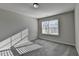 Well-lit bedroom with neutral carpet, and plenty of natural light from the bright sunny exterior at 3608 Crayton Glen Way, Buford, GA 30519