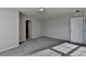 Neutrally decorated bedroom with plush carpet, bright natural light from an exterior window at 3608 Crayton Glen Way, Buford, GA 30519