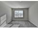 Well-lit bedroom with plush carpet, and lots of natural light from the bright sunny exterior at 3608 Crayton Glen Way, Buford, GA 30519
