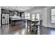 Gourmet kitchen with stainless appliances, granite countertops, and a central island at 3608 Crayton Glen Way, Buford, GA 30519
