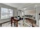 Open-concept living space with hardwood floors and dining area at 3608 Crayton Glen Way, Buford, GA 30519