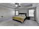 Cozy main bedroom with ceiling fan, side tables, and neutral paint at 3608 Crayton Glen Way, Buford, GA 30519