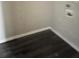Laundry room with gray wood-look vinyl flooring at 304 Deerfield Dr, Jonesboro, GA 30238