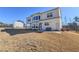 Expansive backyard with a patio area for entertaining at 4205 Madison Hall Dr, Cumming, GA 30028