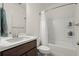 Bathroom with a bathtub, shower, and white countertops at 4205 Madison Hall Dr, Cumming, GA 30028