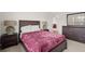 Bedroom with wooden furniture, including a dresser and nightstands at 4205 Madison Hall Dr, Cumming, GA 30028