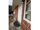 Close up exterior view of front door, showing the brick facade of the home at 692 Johnson Road, Jonesboro, GA 30236