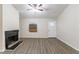 Inviting living room featuring a fireplace and wood-look floors at 2370 Wingfoot Pl, Decatur, GA 30035