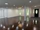 Spacious living room with hardwood floors, recessed lighting, and modern fixtures at 2899 Tejas Sw Trl, Atlanta, GA 30331