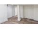 Bright, neutral room with modern flooring and trim, offering a versatile space for various uses at 2899 Tejas Sw Trl, Atlanta, GA 30331
