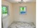 Bright, airy room with two windows and elegant marble floors at 2899 Tejas Sw Trl, Atlanta, GA 30331