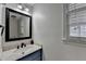 Half bath with updated sink and vanity at 161 Muddy River Rd, Lawrenceville, GA 30043