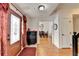 The foyer boasts hardwood floors, a stylish door, and seamless flow into the dining area at 161 Muddy River Rd, Lawrenceville, GA 30043