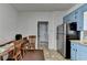 Eat-in kitchen offers stainless steel appliances and blue cabinets at 161 Muddy River Rd, Lawrenceville, GA 30043