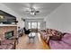 Large living room with a ceiling fan and bay window at 161 Muddy River Rd, Lawrenceville, GA 30043
