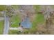 Aerial view of the house showing the roof, yard and surrounding area at 2923 Hall Se Dr, Smyrna, GA 30082