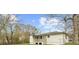 View of the home's backyard, including the back porch and fencing at 2923 Hall Se Dr, Smyrna, GA 30082