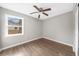 Bedroom with wood floors and a ceiling fan at 2923 Hall Se Dr, Smyrna, GA 30082