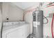 Laundry room with washer, dryer, and water heater at 2923 Hall Se Dr, Smyrna, GA 30082