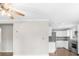 Open-concept living space with pristine white walls, hardwood-style floors, and modern lighting at 2923 Hall Se Dr, Smyrna, GA 30082