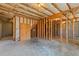 Spacious unfinished basement with concrete floor and exposed ceiling at 4263 Winslow Hill Ct, Suwanee, GA 30024